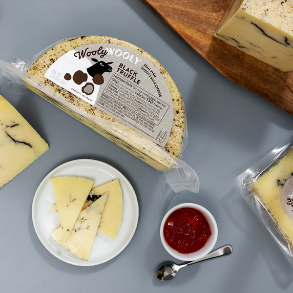 Sheep Cheese with Black Truffle – Semi-Firm (3–3.5 lb Half Wheel)